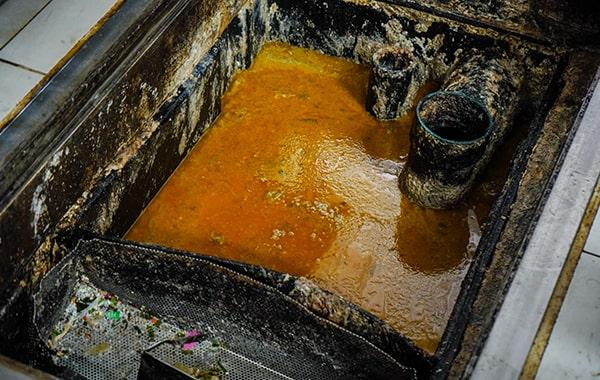 procrastinating on grease trap cleaning can lead to foul odors, sanitation problems, and costly repairs